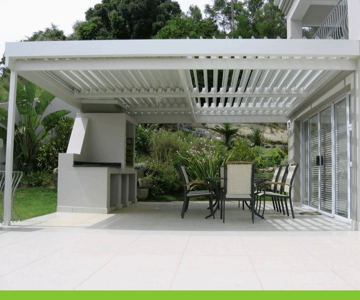 Adjustable and customised louvre roof installed by Down To Earth