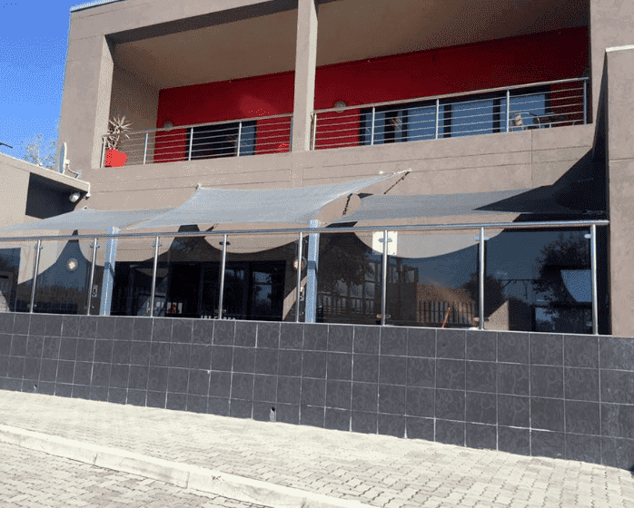 Square shade sail canopy for residential property