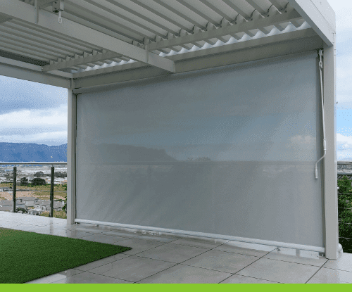 We installed outdoor blinds to shade a patio in a home 