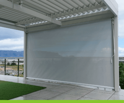 We installed outdoor blinds to shade a patio in a home