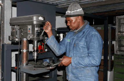 One of our qualified engineers tailor making a shade product